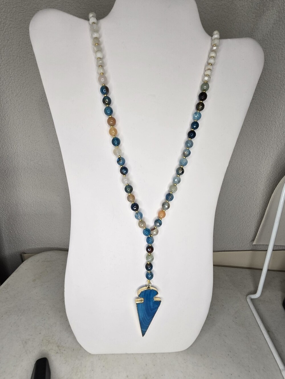 Multicolor Beaded Necklace with Blue Arrowhead Pendant